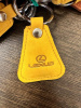 Брелок АвтоШТАБ желтый треугольник LEXUS (арт. 00001)