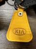 Брелок АвтоШТАБ желтый треугольник KIA  (арт. 00001)